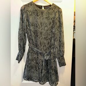 Green and black dress dynamite size 6 with tie belt. Worn once.